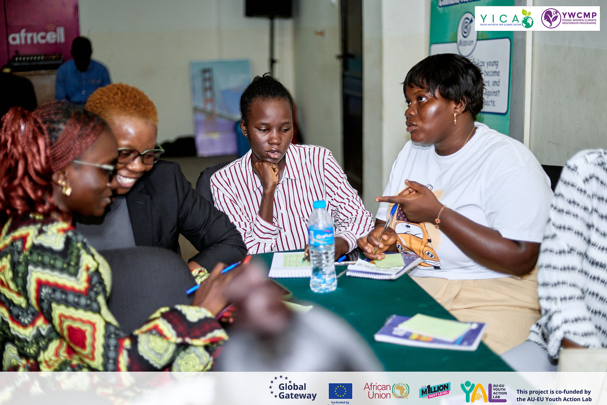 Mentees and mentors working through an exercise in small groups